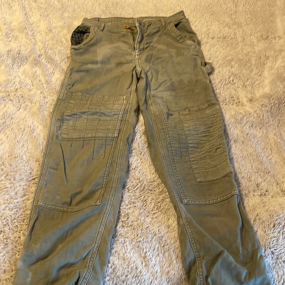 Light green carpenter pants, bleech stains .